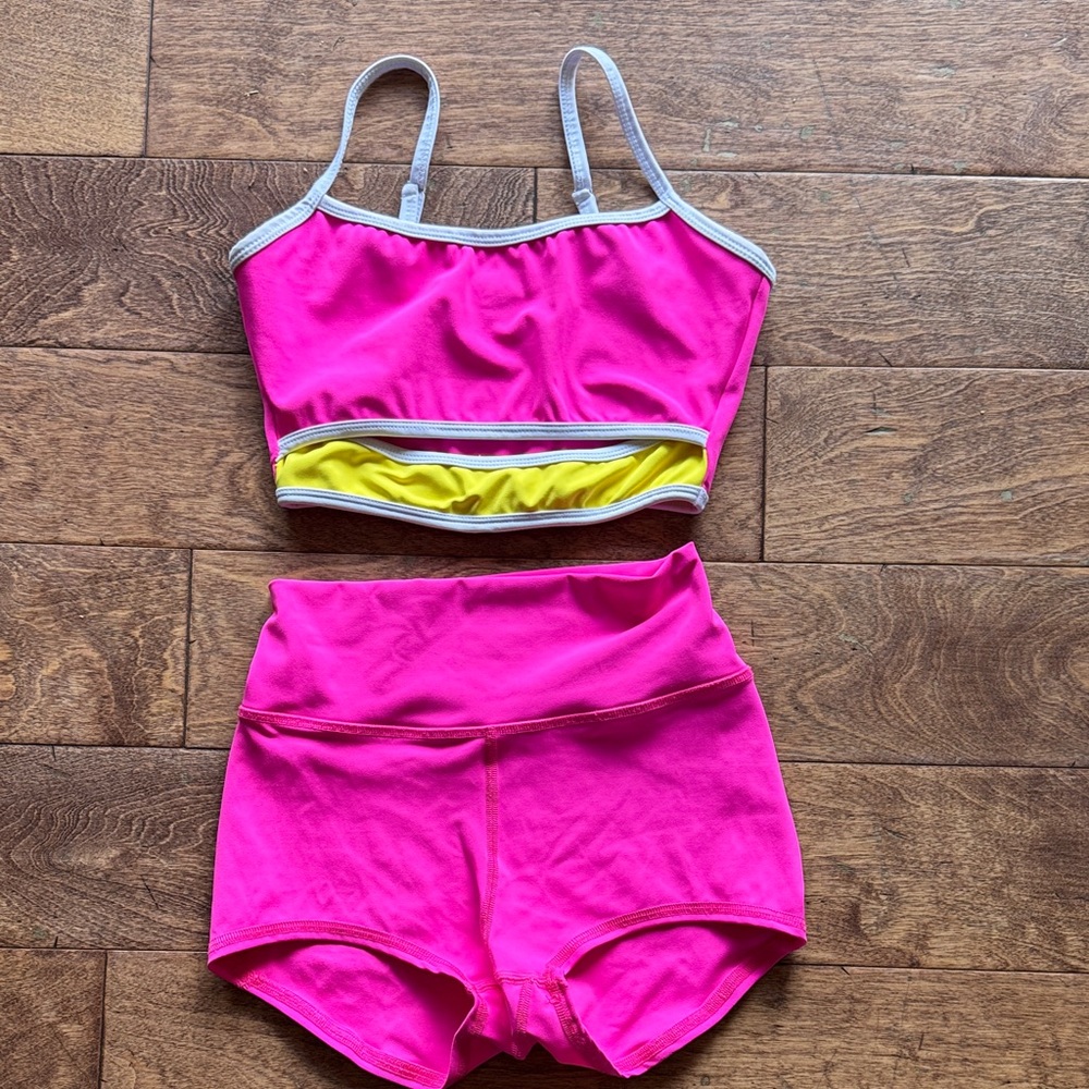 Pink Two-Piece Athletic Crop Top and High-Waist Shorts